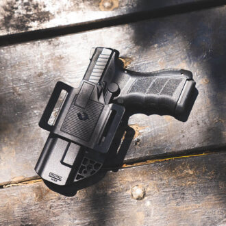 פאדל לנרתיקי EVO לנשיאה פנימית או חיצונית – אורפז מורכב על אקדח פאדל לנרתיקי EVO לנשיאה פנימית או חיצונית – אורפז מורכב על אקדח